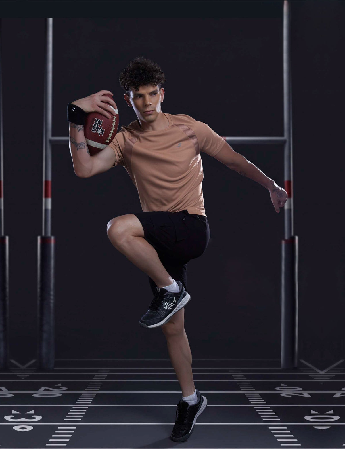 Sportzfit Men's Dot-Mesh Raglan Tee in Peach – full-length action pose
