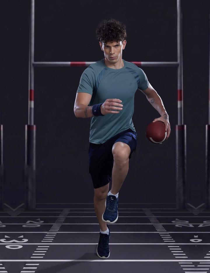 Sportzfit Men's Dot-Mesh Raglan Tee in Teal – full-length action pose