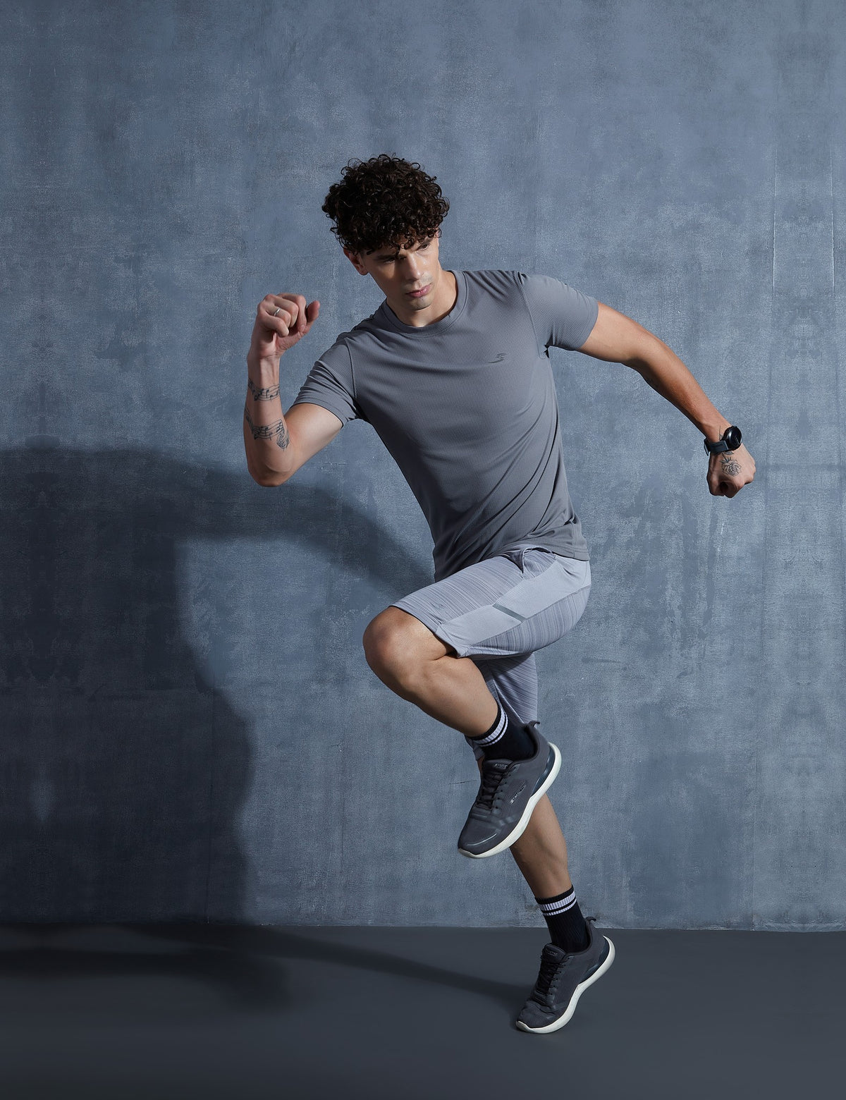 Sportzfit Men's Micro-Matte Tee in Charcoal Grey – full-length action pose