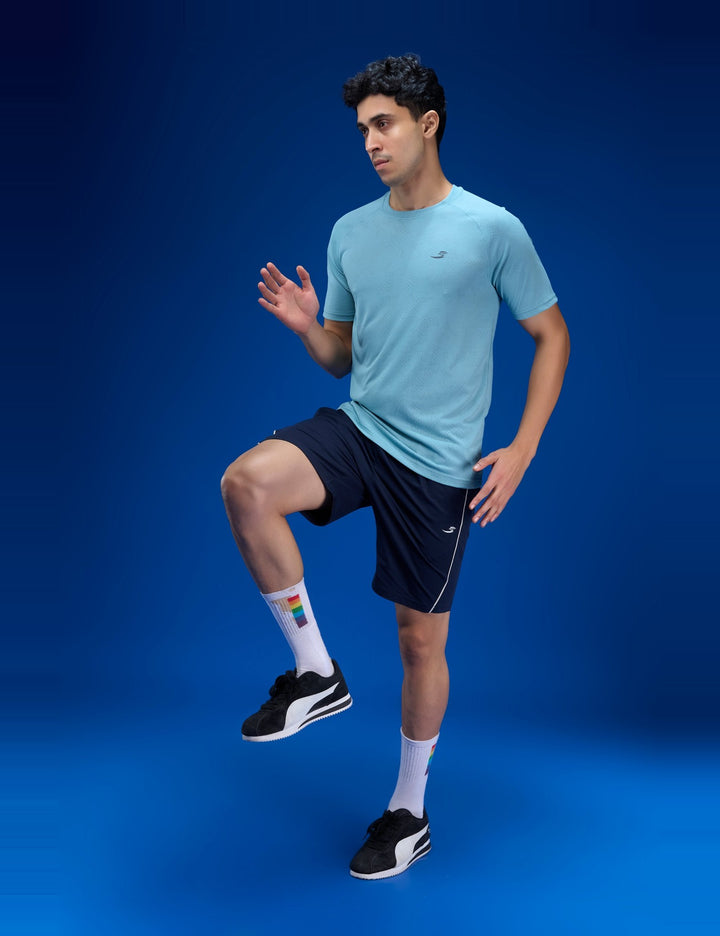 Sportzfit Men's Geo-Mesh Tee in Aqua Blue – action pose
